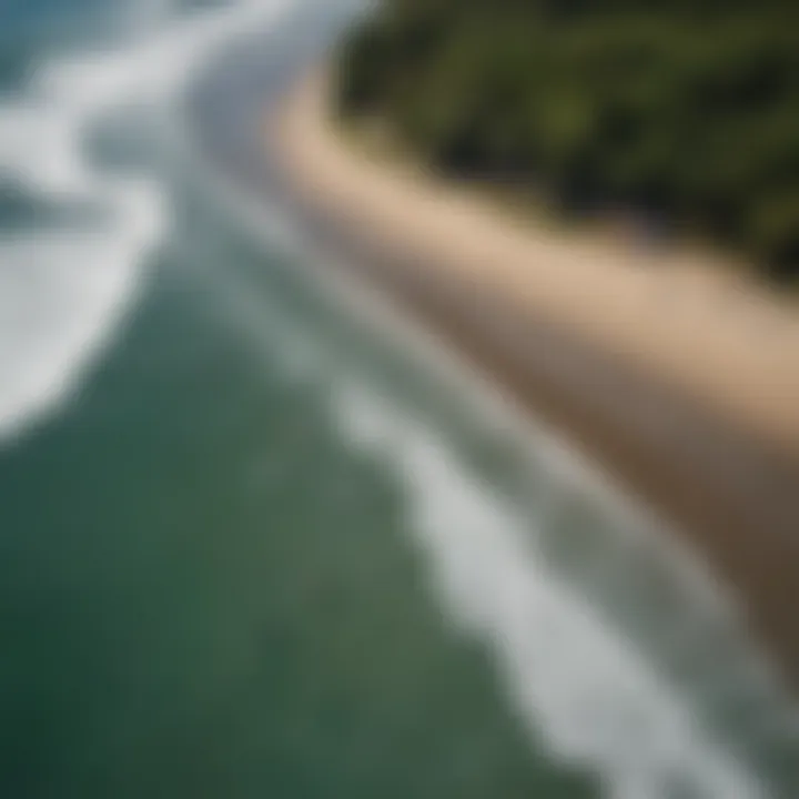 Aerial view of surfers catching waves at Playa Biesanz in Quepos, Costa Rica