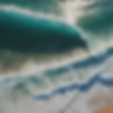 Aerial view of turquoise waves crashing on the North Shore shores