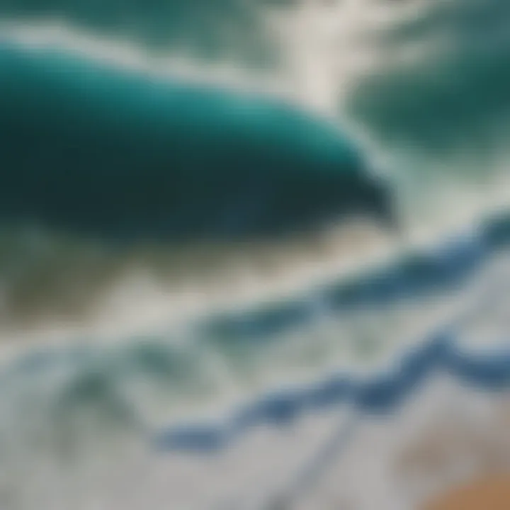 Aerial view of turquoise waves crashing on the North Shore shores