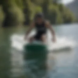A sleek Austin Keen board gliding across clear waters