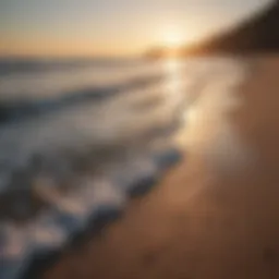 A serene beach at sunset with gentle waves lapping the shore