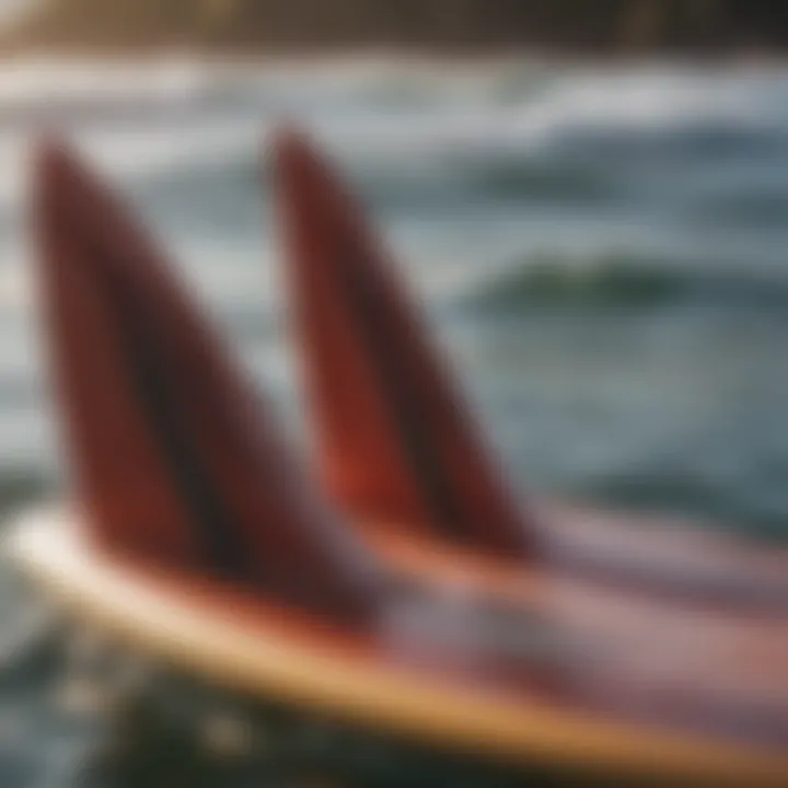 Close-up of surfboard fins in the water