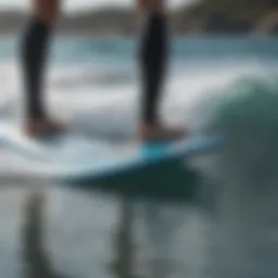 High-performance electric foil surfboard gliding over waves