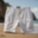 Billabong white shorts displayed on a sandy beach