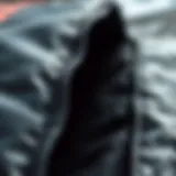 A close-up view of a high-quality bodyboarding bag showcasing its durable material and stitching.