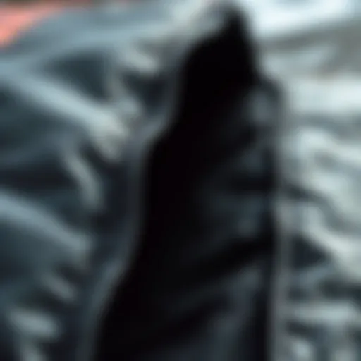 A close-up view of a high-quality bodyboarding bag showcasing its durable material and stitching.