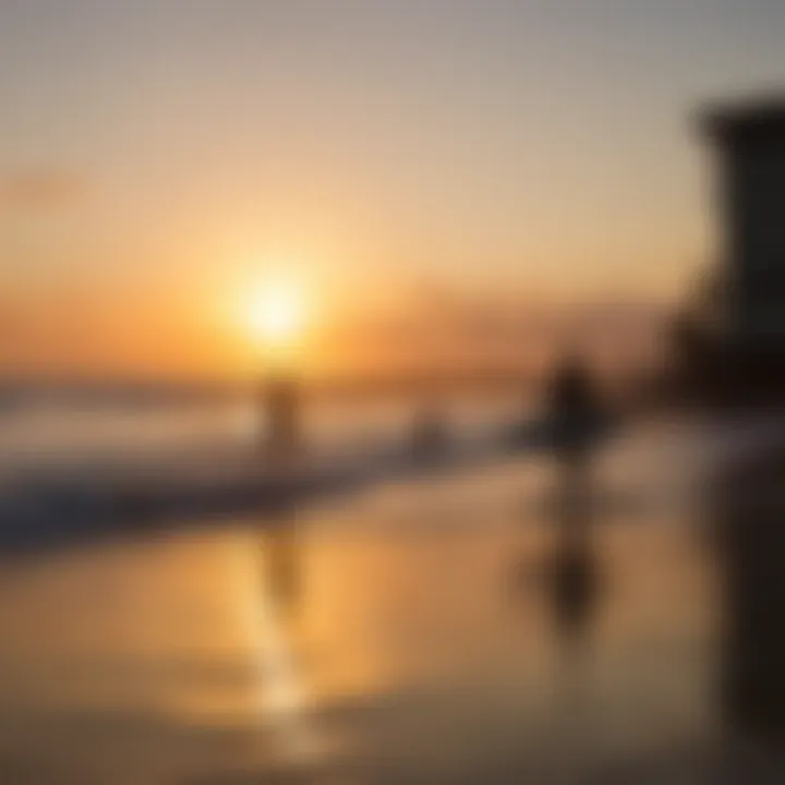 Sunset silhouette of surfers at BSR Surf Resort against a vibrant sky