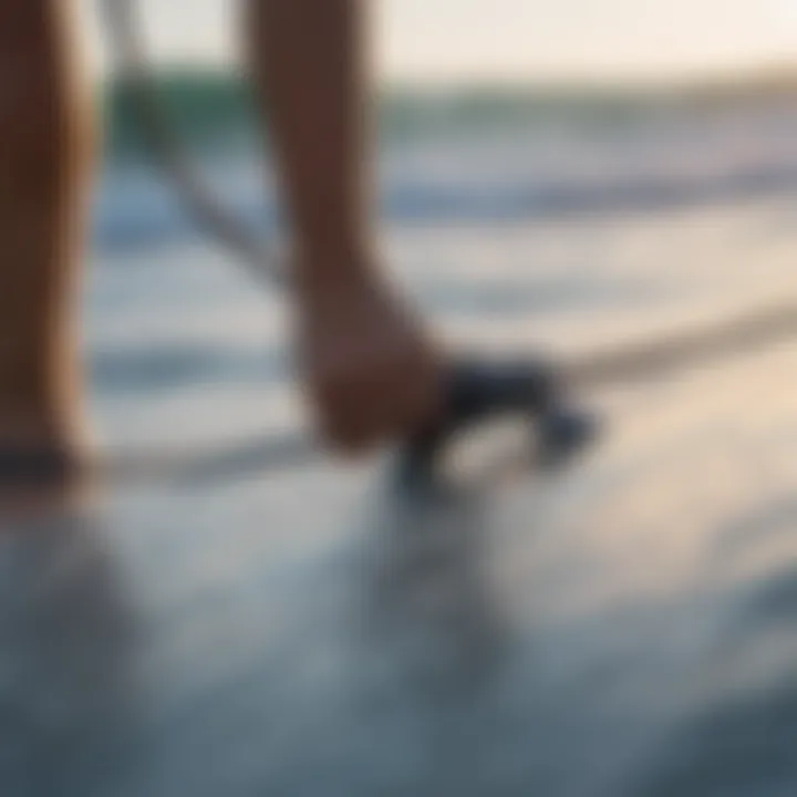 Close-up of leash attachment on surfboard