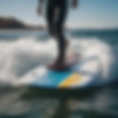 Close-up of wake foil board cutting through the waves