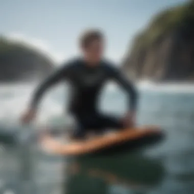 An athlete showcasing the technique of using bodyboarding fins in the water.