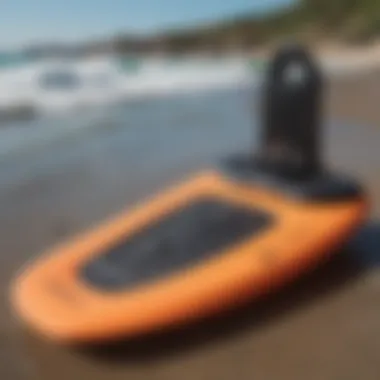 Close-up of bodyboarding equipment including a board and fins