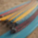 A close-up view showcasing a variety of surfboard leashes in different materials and colors.