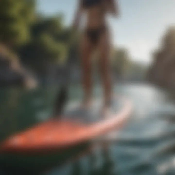 Watersports enthusiast confidently riding a waxed paddleboard