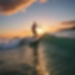 Paddleboarder riding a cresting wave at sunset