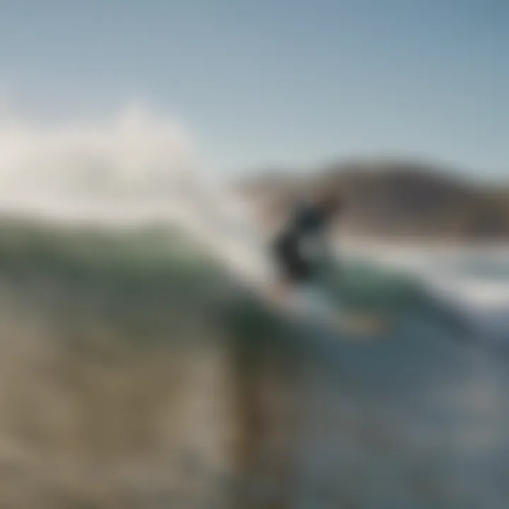 Surfer catching a perfect wave at Del Mar beach