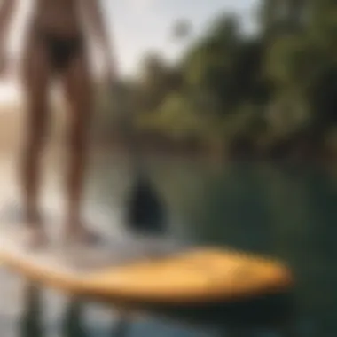 A person measuring paddle board dimensions