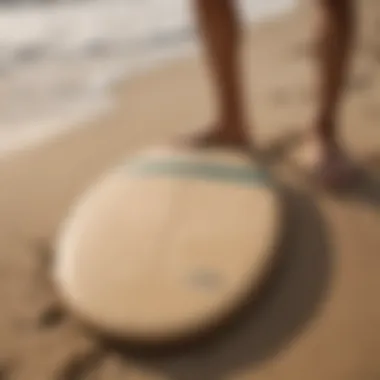 Diverse types of skimboards displayed on a sandy beach