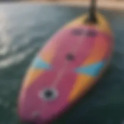 Detailed view of epoxy paddleboard surface showcasing its smooth finish and vibrant colors