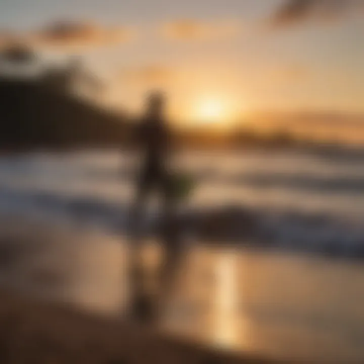 Sunset silhouette of a surfer at Hookipa Beach Park