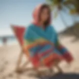 Vibrant Billabong hooded towel draped on a beach chair