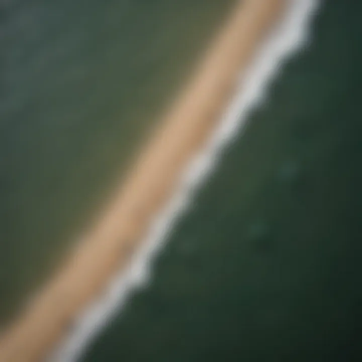 Aerial view of kitesurfers riding the waves along the Portuguese coast