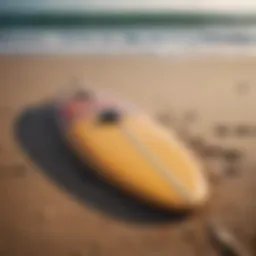 A vintage surfboard resting on the beach, symbolizing nostalgia