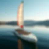Paddle board with a sail attachment on a calm lake