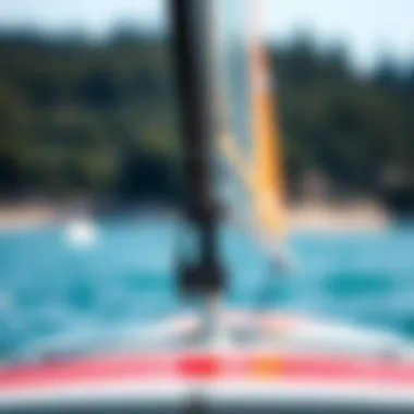 Sail Attachment Mechanism for Paddle Boards Close-up view of a sail attachment mechanism on a paddle board