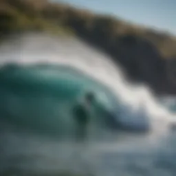 Surfer riding a wave in Patagonia's stunning coastline