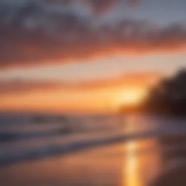 A vibrant sunset over Huntington Beach with surfers in the water