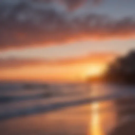 A vibrant sunset over Huntington Beach with surfers in the water