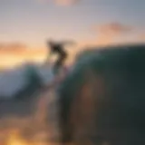 Surfer riding a wave at sunset