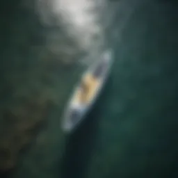 Aerial view of sleek SUP foil board cutting through the water