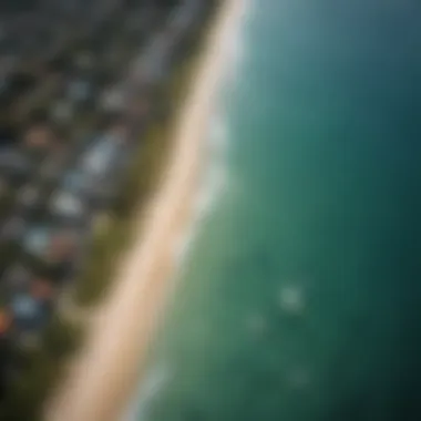 Aerial view of a coastal paradise with surfboards lining the shore