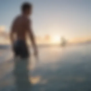 Surfer inspecting used soft top surfboard