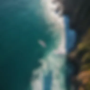 Aerial view of a wing surfer gliding over crystal-clear waters