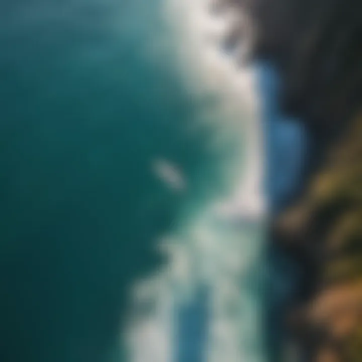 Aerial view of a wing surfer gliding over crystal-clear waters