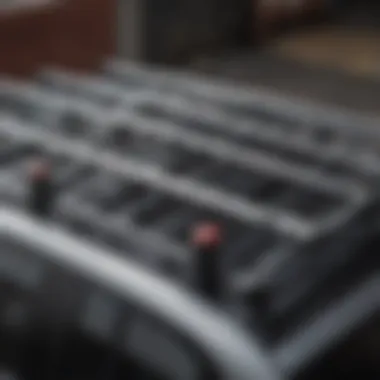 A close-up view of a roof rack's features and attachment mechanisms on a sedan.