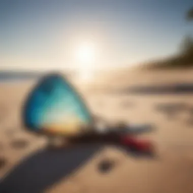 Kite surfing gear displayed on a beach