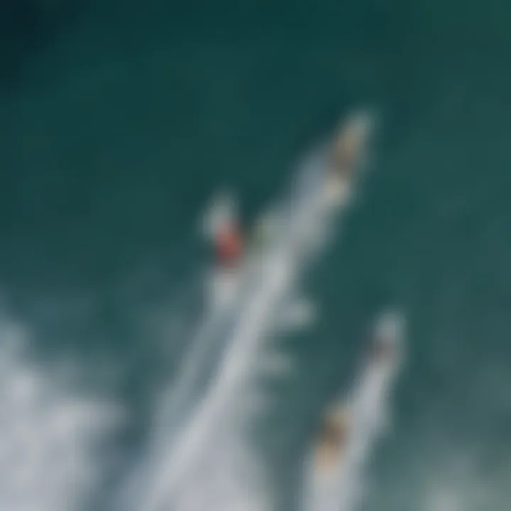 Aerial view of surfers navigating the waves at Honoli'i Beach Park