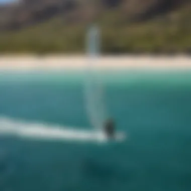 Kite surfer soaring over the turquoise waters of Las Barriles