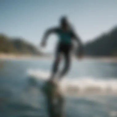 Kiteboarder gracefully navigating through crystal-clear waters