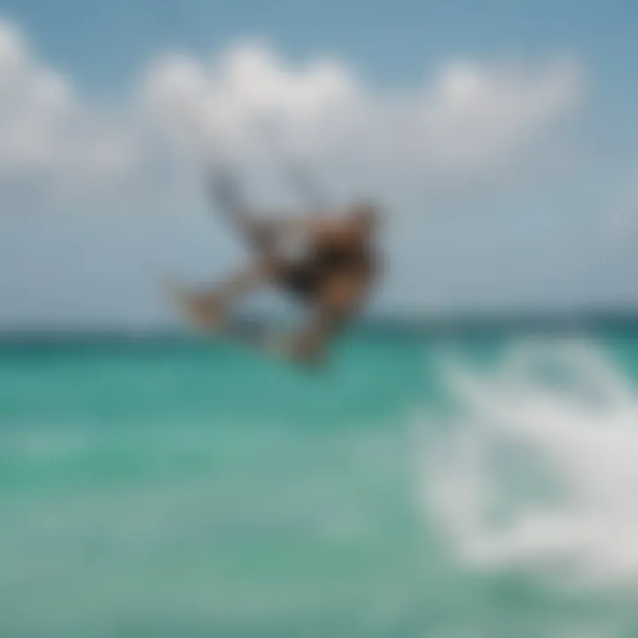 Kiteboarder performing impressive tricks against Aruba's picturesque coastline