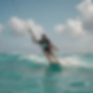 Kiteboarder navigating the turquoise waves in Aruba