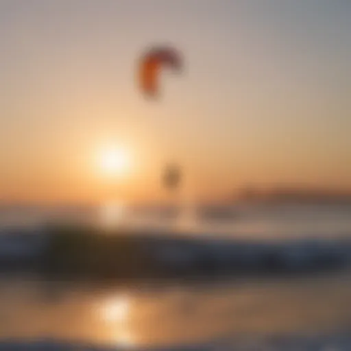 A breathtaking view of a kitesurfer gliding across the waves during sunset