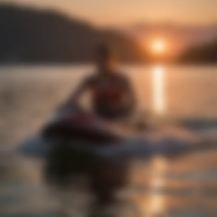 A serene kneeboarding scene at sunset