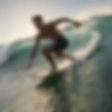 Surfer riding a wave on the historic surfboard