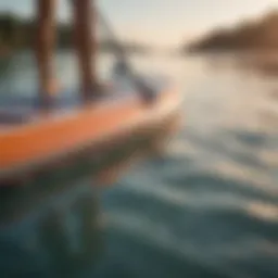 Inflatable paddle board with visible repairs