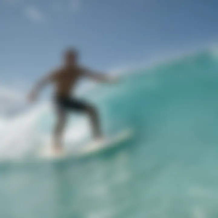 Surfer catching a wave on turquoise waters