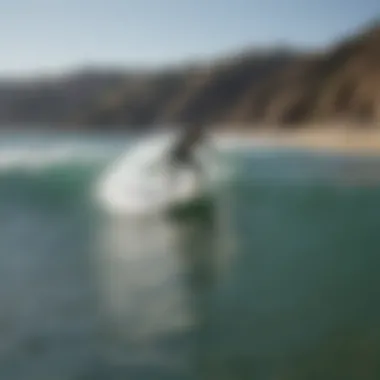 Surfer navigating the barrels at Malibu Point